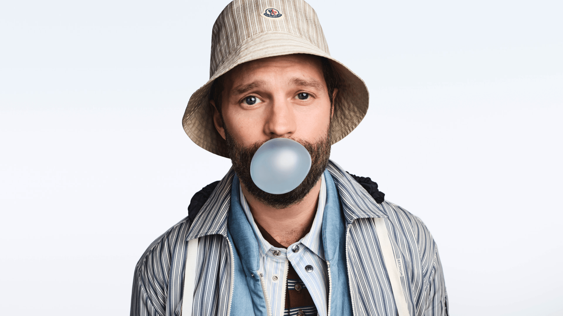 Moncler Shifts Gears with Jamie Dornan for Summer 2026